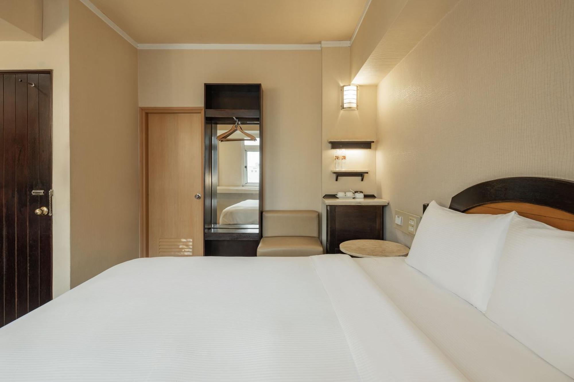גאושיונג Kindness Hotel Weiwuying חדר תמונה