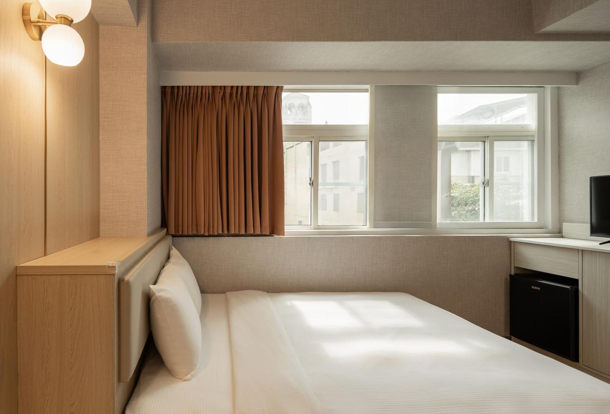 גאושיונג Kindness Hotel Weiwuying מראה חיצוני תמונה